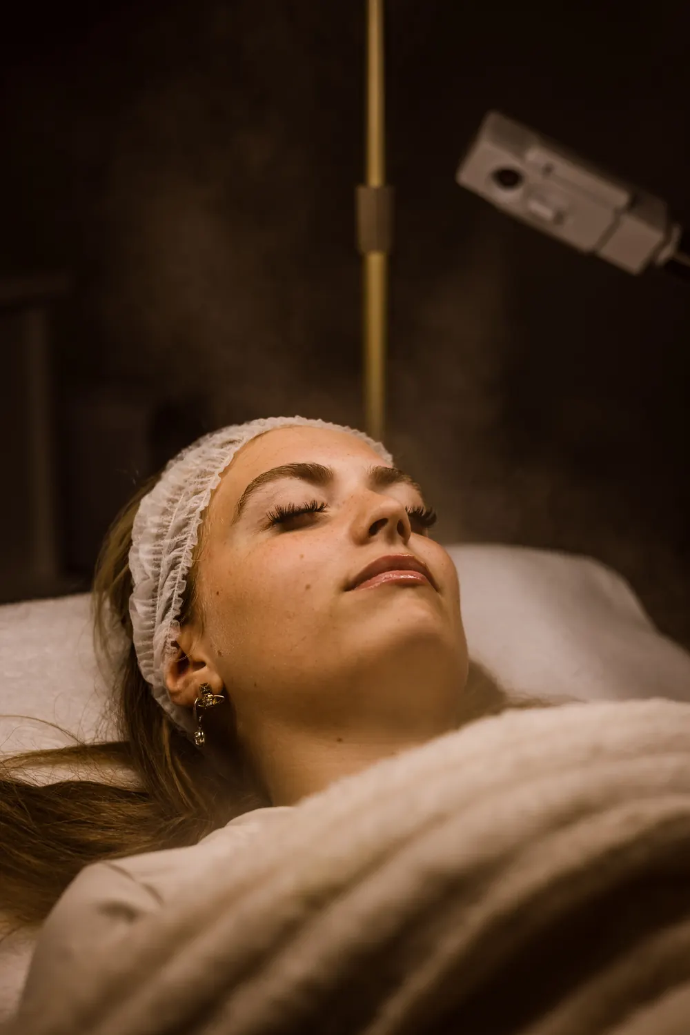 Client relaxing during a steam facial
